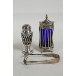 Two hallmarked silver condiments/sifters with blue glass liners, and a pair of tongs, largest 3½",