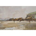 Village scene, and study of figures on a beach, one signed Edward Wesson, pair of unframed