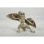 A Sino-Tibetan filled silvered metal figure of Garuda, 9" wide x 6" high