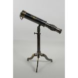 A reproduction brass W. Ottway and Co. telescope, 9" long retracted