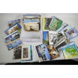 A shoe box of postcards, mainly topographical