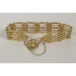 A 9ct yellow gold 7" gate bracelet with heart shaped padlock, marked, total weight 13g