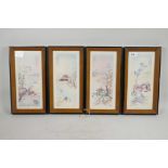 A set of four Chinese coloured prints, river landscapes with figures, 5" x 11"