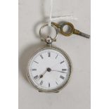 A hallmarked silver keyring fob watch, with white enamel dial and Roman numerals, with key, 1½"