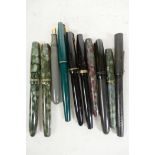 A collection of ten vintage fountain pens including Burnham, Parker, Waterman etc (nib and one cap