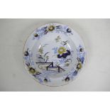 A C19th Wedgwood stone china dish with blue and white and gilt floral decoration, 9½" diameter