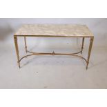 A brass coffee table with inset Carrara marble top, 20" x 40" x 21"