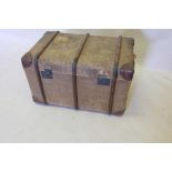 A late C19th/early C20th canvas and leather bentwood strapped trunk, bears label W. Ogburn & Son,