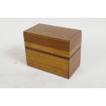 A treen box with inlaid mosaic pattern cover, 4¼" x 3¼" x 2¼"