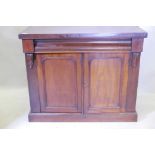 A Victorian mahogany chiffonier base, with single moulded frieze drawer over two cupboards, raised