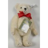 A Harrods Steiff Limited Edition musical teddy bear, a replica of a 1909 teddy bear, produced