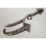 A Moorish dagger with wood handle and white metal and brass embellished scabbard, 15" long