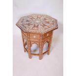 A Hoshiarpur octagonal occasional table, 18" high, 18" wide