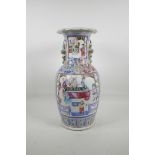 A C19th Chinese export famille rose porcelain baluster vase, with twin moulded handles, raised