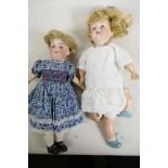 A German doll with bisque head, no.21, sleeping eyes and open mouth with four teeth and having