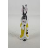A rare Goebel porcelain sugar sifter formed as a female hare in a fur coat, 6¼" high
