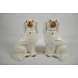 A pair of mid C19th Staffordshire porcelain mantle dogs, a good example of its type, 10" high x 6"