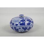 A Chinese blue and white porcelain jar and cover decorated with flowers and leaves, 6¼" diameter
