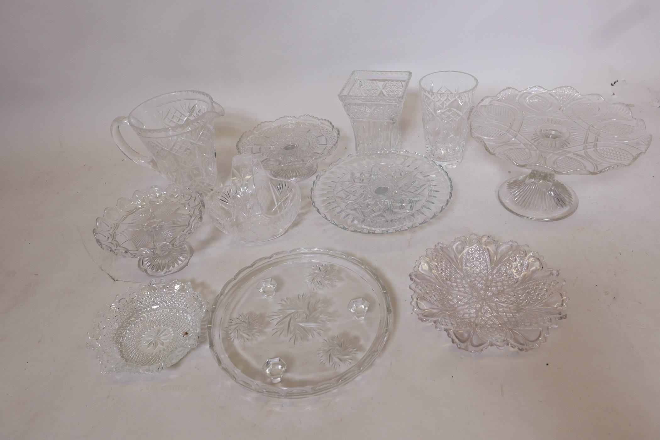 A quantity of good quality cut and pressed glassware including a small Bohemian crystal basket, a