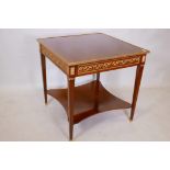 A French style walnut and ormolu mounted centre table with patera and Greek Key and wreath