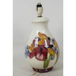 A Moorcroft pottery floral lamp base, 12" high