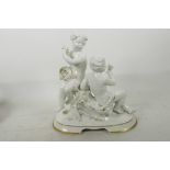 A Continental white glazed porcelain Bacchanalian figure group, 10½" high
