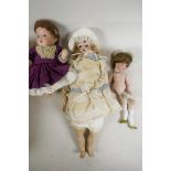 A German doll with bisque head, model 9/P, having fixed eyes and with fabric body and bisque arms,