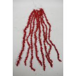 Eight strings of natural form coral, 16" long