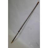 A carriage whip by Crawley & Sons of Peterborough, with steel core whip shaft, leather handle and
