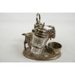 A mid Victorian silver plated novelty cruet set, modelled as a goat drinking from a trough, patent