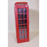 A wood wine rack in the form of a 1930 red telephone box, with illuminated interior 13" x 15" x 41"