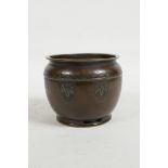 A Chinese bronze planter with engraved decoration, 4½" diameter