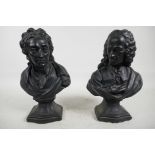 A pair of decorative plaster busts of 'Puccini' and 'Voltaire', black finish, marked recto, 11" x