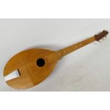 An unusual hand made lute/mandolin, 23" long