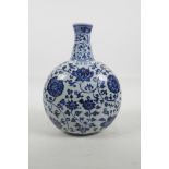 A Chinese blue and white porcelain moon flask with all over scrolling lotus flower decoration, 4