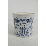 A Chinese blue and white porcelain brush pot, decorated with carp, 7½" high, 7½" diameter