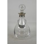 A Dartington glass 'bubble' spirit decanter with silver collar and blank label, hallmarked London