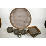 A collection of tradesman's sample sieves from Bryan Corcoran Ltd c1900 and a large sieve from the