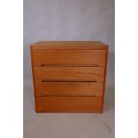 A 1960s four drawer plywood chest, 30" x 16" x 30"