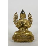 A Sino Tibetan gilt bronze figurine of Buddha seated in meditation, double vajra mark to base, 8½"