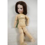 An SFBJ doll having bisque head, no.6, with closing eyes and open mouth with four teeth, having