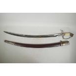 An antique British Army pattern sabre with lion mask pommel and bone hand grip, the blade