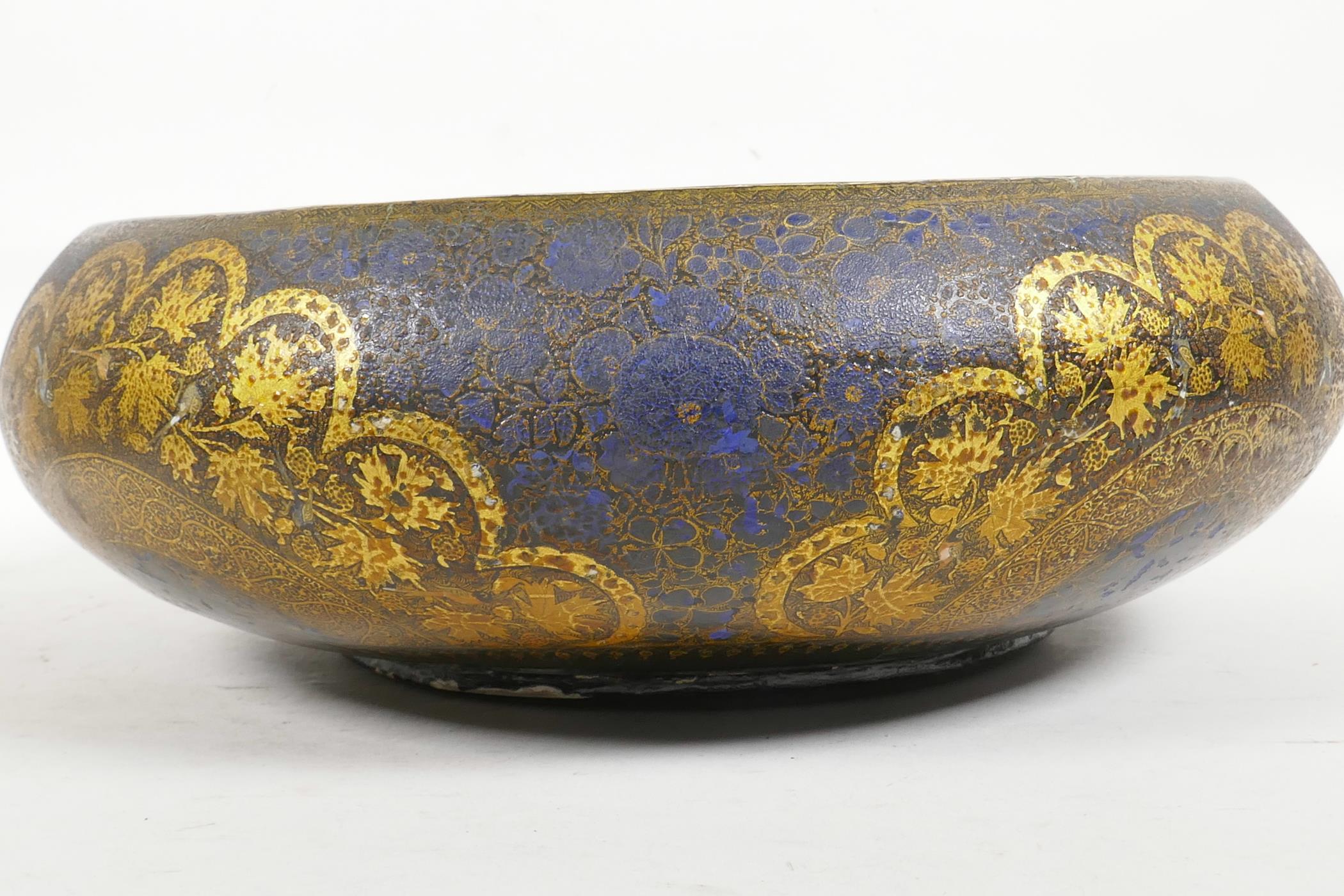 A Kashmiri brass and lacquer bowl with a rolled rim, decorated with gilt floral patterns, signed - Image 3 of 7