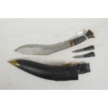 A Gurkha soldier's kukri knife, in leather sheath, purchased from the Officer's Mess of the Royal