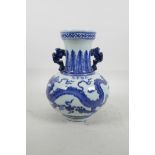 A Chinese blue and white porcelain two handled vase with dragon and phoenix decoration, 4