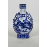 A Chinese blue and white porcelain moon flask with dragon handles, decorated with lake scenes and