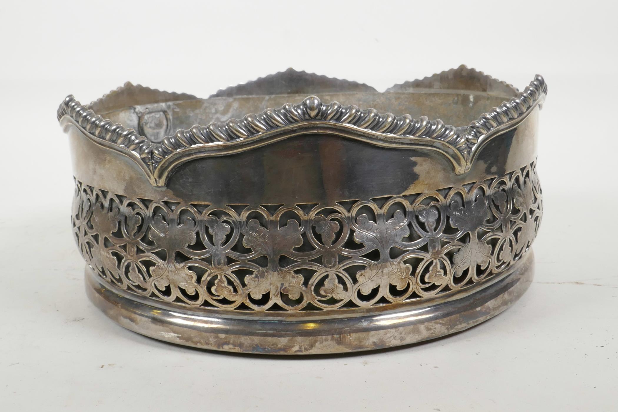 A silver plated table centrepiece coaster, with pierced foliate decoration and gadrooned rim, and - Image 3 of 3