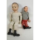 Two ventriloquist's dolls with opening mouths, one with moving head, largest 20" long