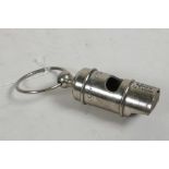 A reproduction silver plated White Star Line whistle, 3½" long