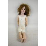 A Simon & Halbig doll, no.1078-10, with bisque head, sleeping eyes and open mouth with four teeth,
